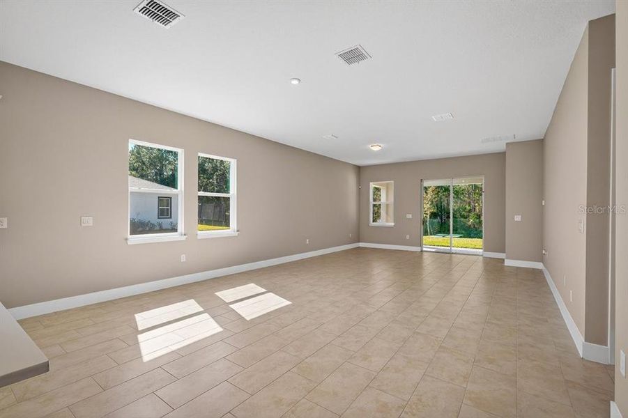 Spacious, unfurnished interior of a new home in Gray Hawk at Hole Two, Daytona Beach (Image 38).