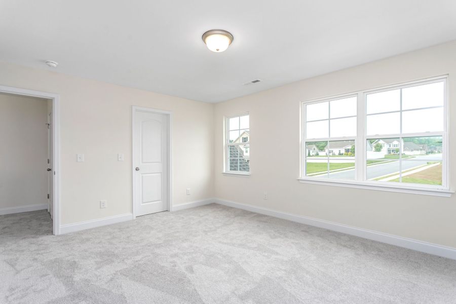 Representative unfurnished interior of a home built from the Jamestown by Keystone Homes NC in Sullivans Reserve, Walkertown (Image 33).