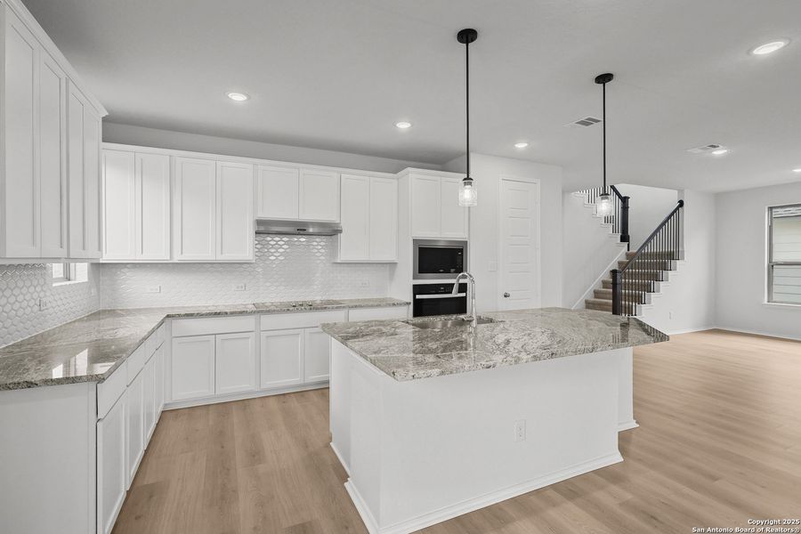 Furnished interior view inside a new home in Overlook at Creekside, New Braunfels (Image 9).