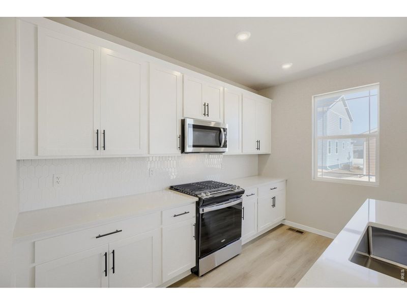Furnished interior view inside a new home in Farmstead, Berthoud (Image 27).