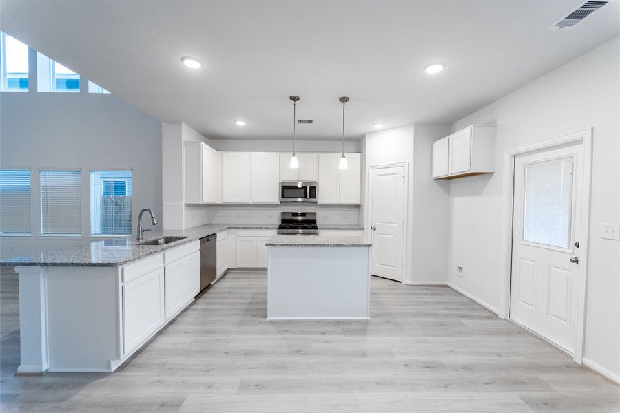 Furnished interior view inside a new home in Caney Mills, Conroe (Image 10).