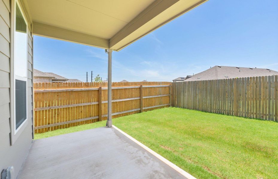 Exterior details and patio area of a home in Crosswinds, Kyle (Image 21).
