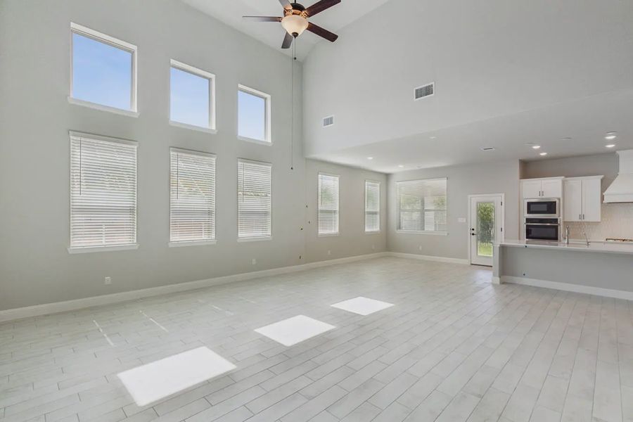 Representative unfurnished interior of a home built from the Avalon by Chesmar Homes in Las Lomas 60's, Forney (Image 3).