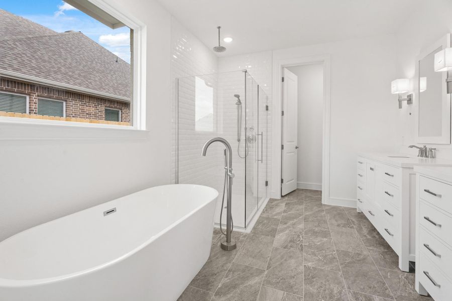 Luxurious primary bath (*Photo not of actual home and used for illustration purposes only.) Luxurious primary bath (*Photo not of actual home and used for illustration purposes only.)