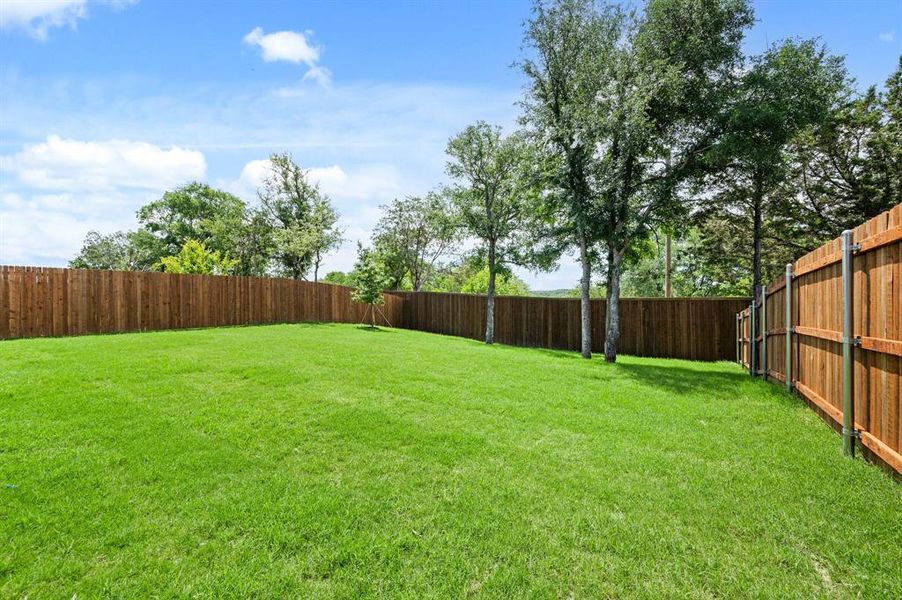 Front exterior of a new home in Parks of Aledo, Aledo, TX, highlighting curb appeal (Image 19). Front exterior of a new home in Parks of Aledo, Aledo, TX, highlighting curb appeal (Image 19).