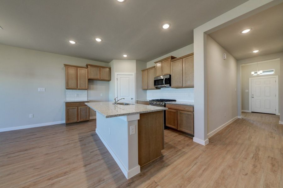 Representative furnished interior of a home built from the Sophora by Hakes Brothers in Hickory Ridge Estates, Elmendorf (Image 8). Representative furnished interior of a home built from the Sophora by Hakes Brothers in Hickory Ridge Estates, Elmendorf (Image 8).