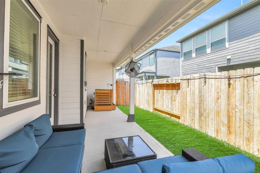 Extended covered outdoor living area designed to seamlessly blend indoor comfort with outdoor enjoyment.