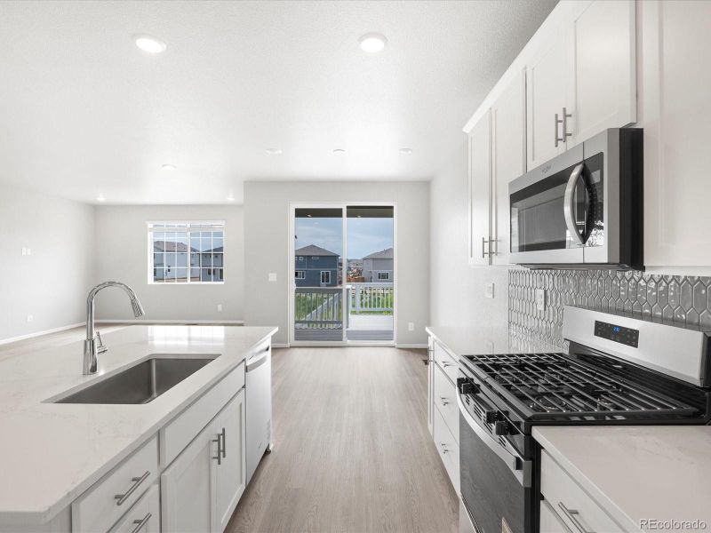 Furnished interior view inside a new home in Buffalo Highlands: The Canyon Collection, Commerce City (Image 9).