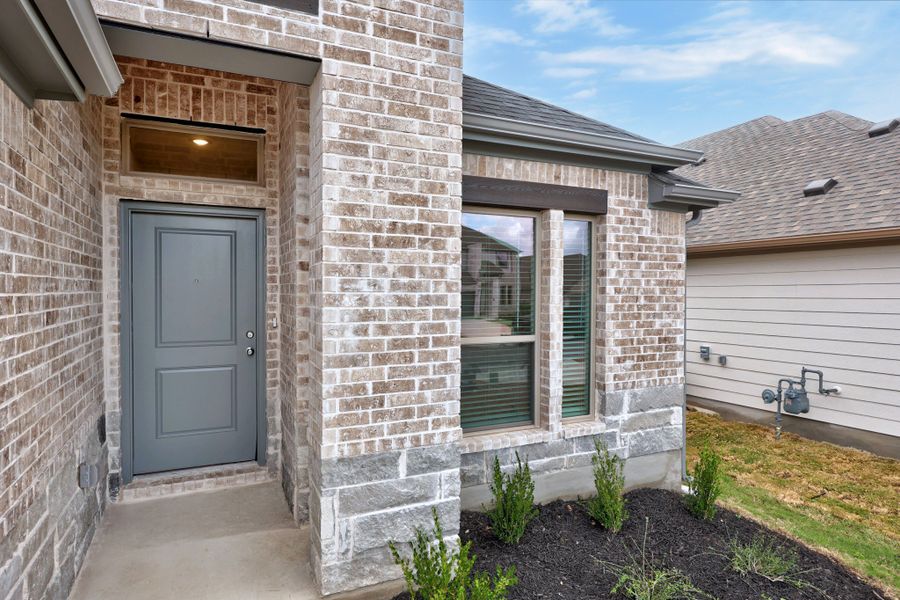 Exterior details and patio area of a home in Prairie Winds, Hutto (Image 3). Exterior details and patio area of a home in Prairie Winds, Hutto (Image 3).