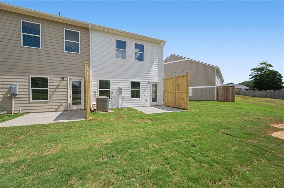 Exterior details and patio area of a home in Village Green, Adairsville (Image 3).
