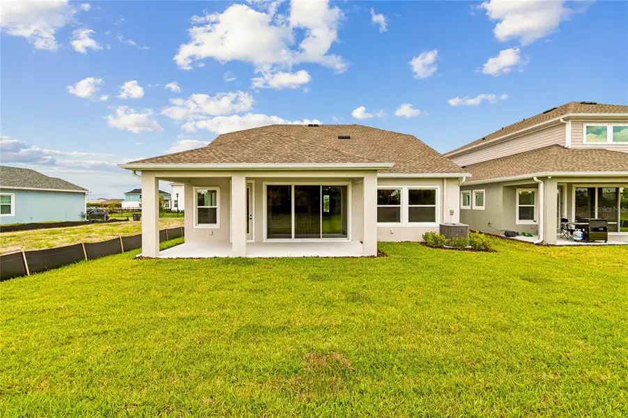 Exterior details and patio area of a home in Waterset Classic Series, Apollo Beach (Image 4).