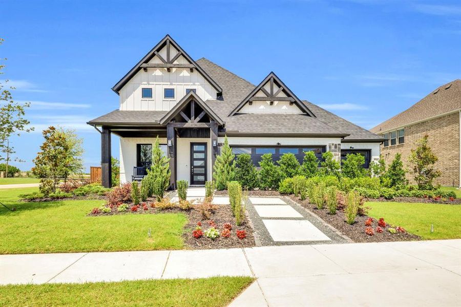 Front exterior of a new home in Polo Ridge, Mesquite, TX, highlighting curb appeal (Image 18).