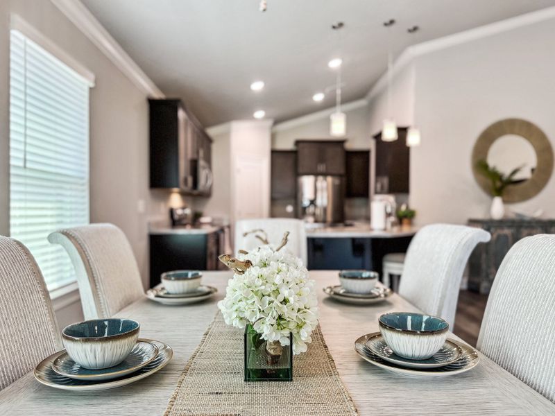 Representative furnished interior of a home built from the The Carlos by Herbst Homes in Doyle Hawkins Landing, Navarre (Image 11).
