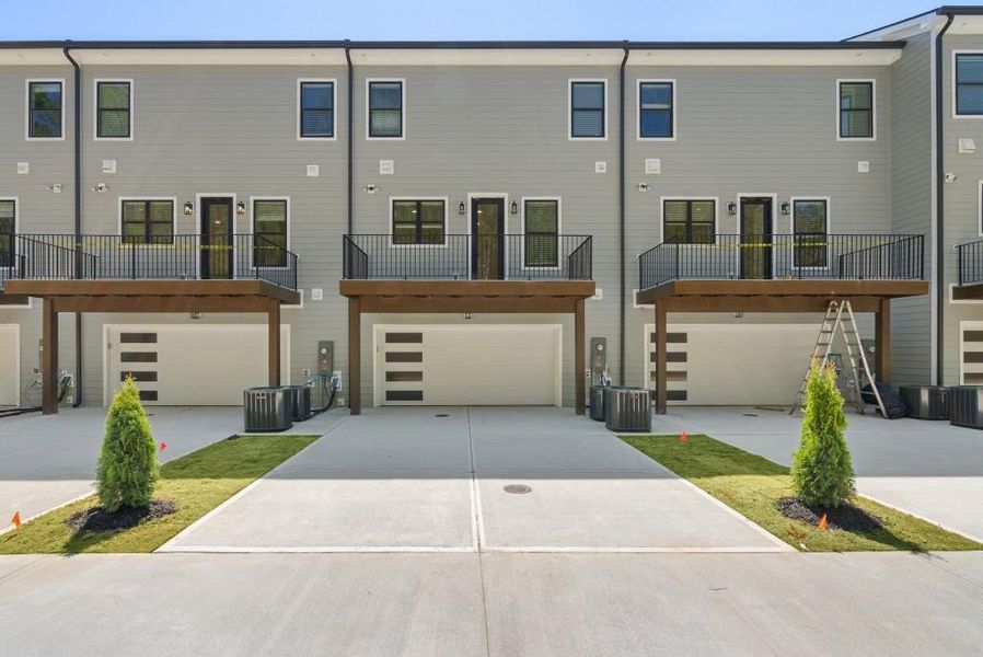 Front exterior of a new home in , Stockbridge, GA, highlighting curb appeal (Image 27).