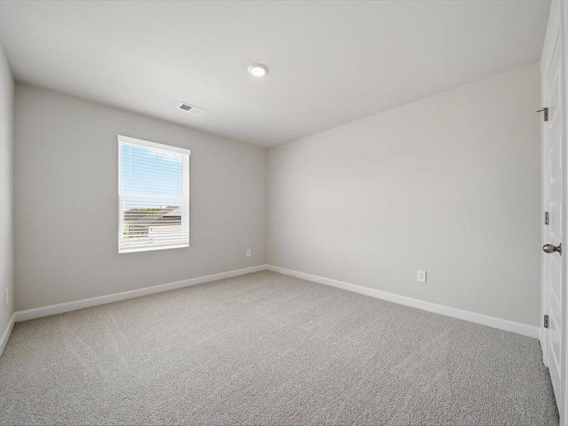 Spacious, unfurnished interior of a new home in The Farm at Wells Creek - Signature Collection, Gray Court (Image 17).