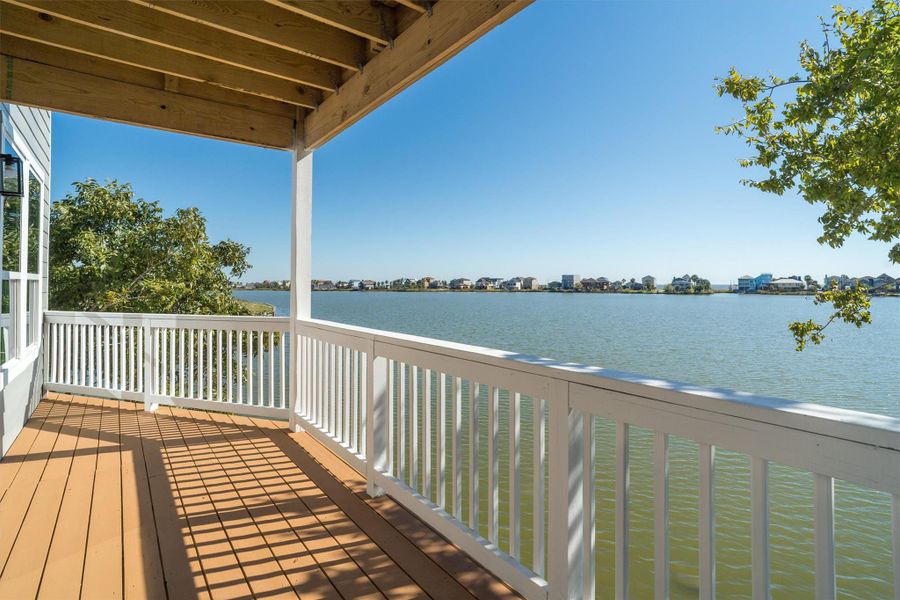 Balcony just outside the living room overlooking the water Balcony just outside the living room overlooking the water