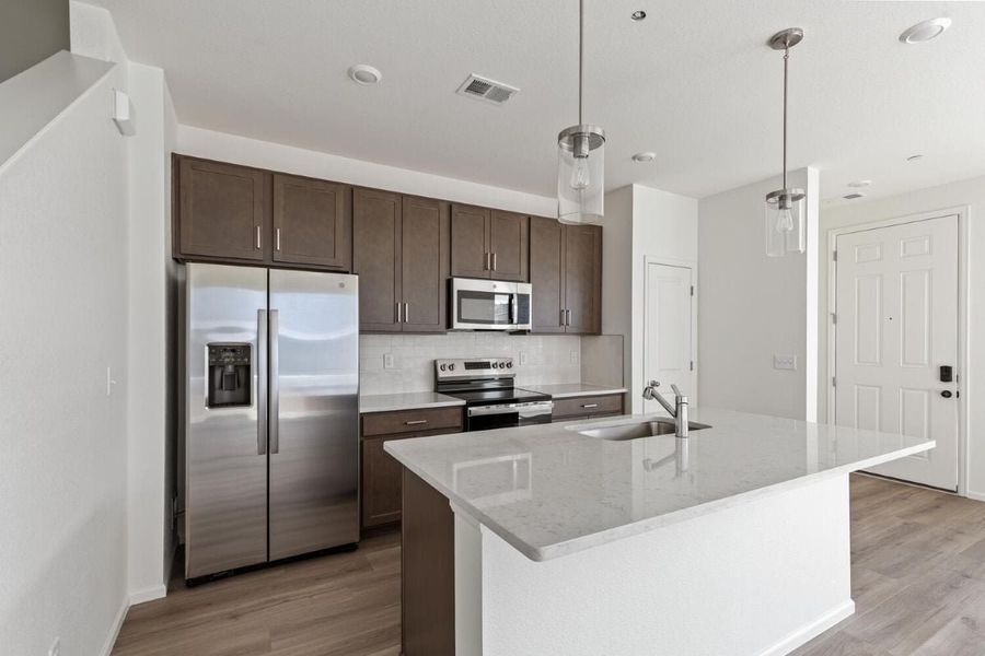Furnished interior view inside a new home in Turnberry Villas, Commerce City (Image 5).