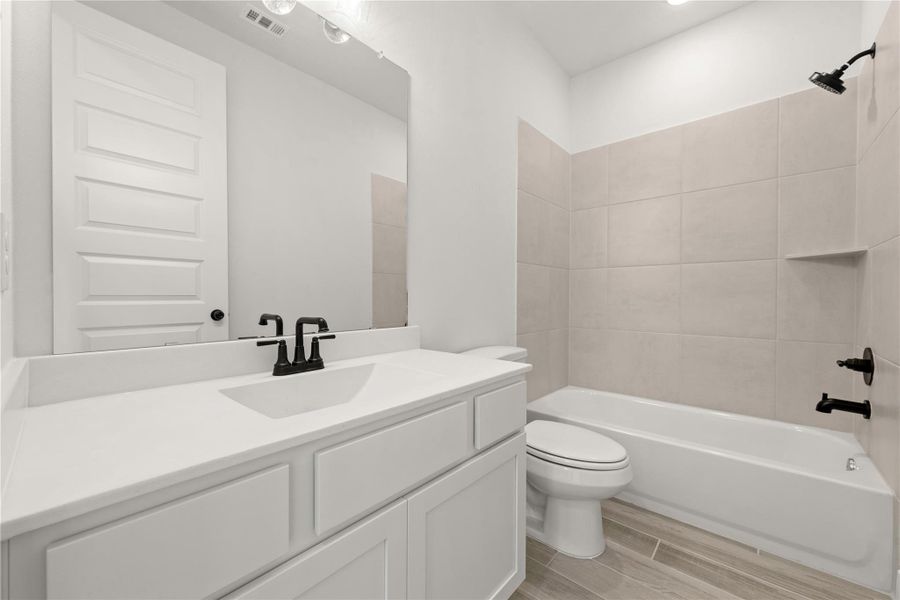 Furnished interior view inside a new home in Elyson, Katy (Image 6).