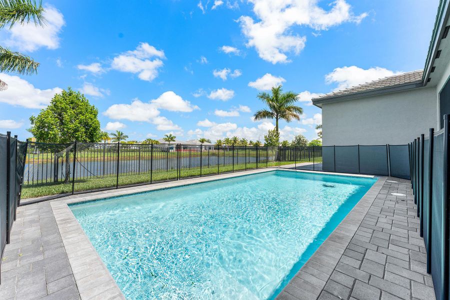 Exterior details and patio area of a home in Valencia Grand, Boynton Beach (Image 4). Exterior details and patio area of a home in Valencia Grand, Boynton Beach (Image 4).
