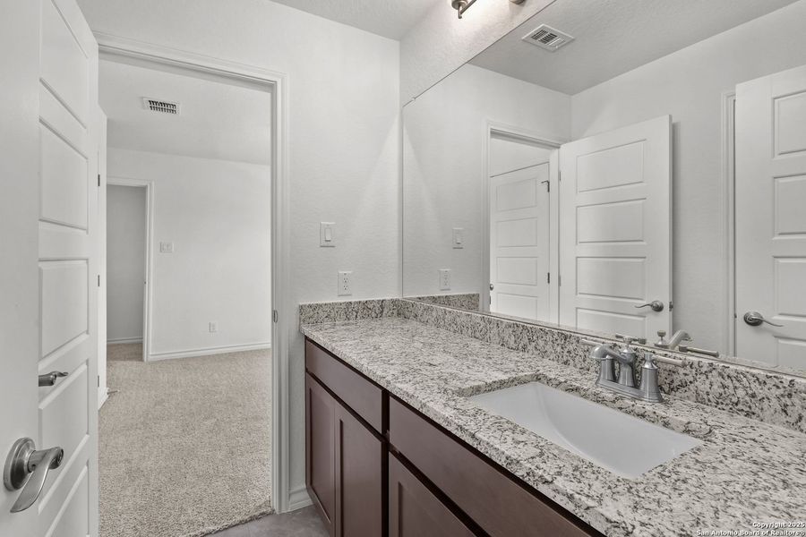 Furnished interior view inside a new home in Ladera, San Antonio (Image 39).