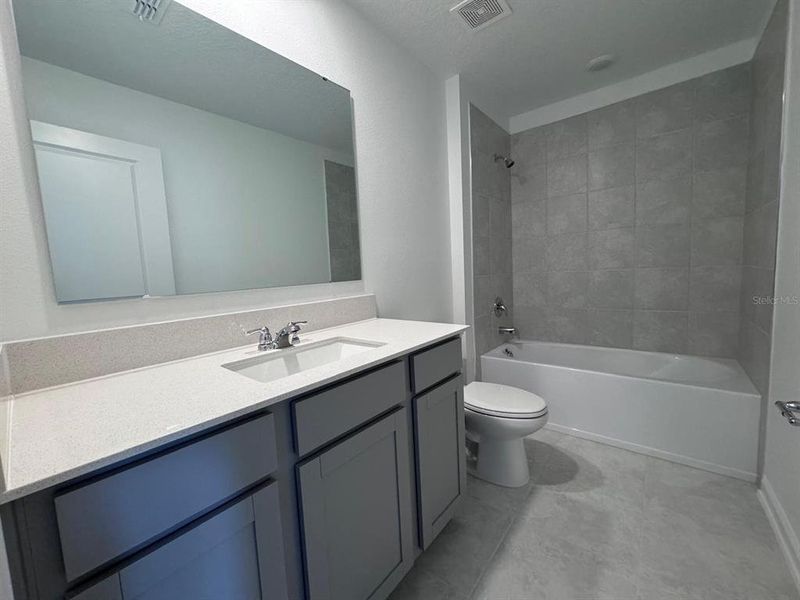 Furnished interior view inside a new home in Cascades, Davenport (Image 11).