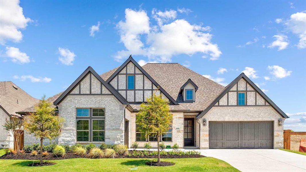 Front exterior of a new home in Terraces 72', Rockwall, TX, highlighting curb appeal (Image 1). Front exterior of a new home in Terraces 72', Rockwall, TX, highlighting curb appeal (Image 1).