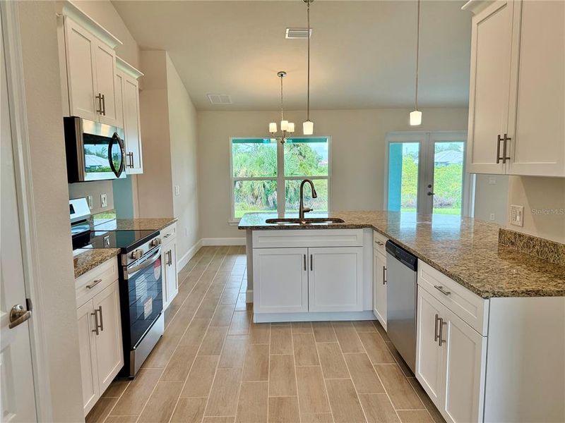 Furnished interior view inside a new home in South Gulf Cove, Port Charlotte (Image 7).