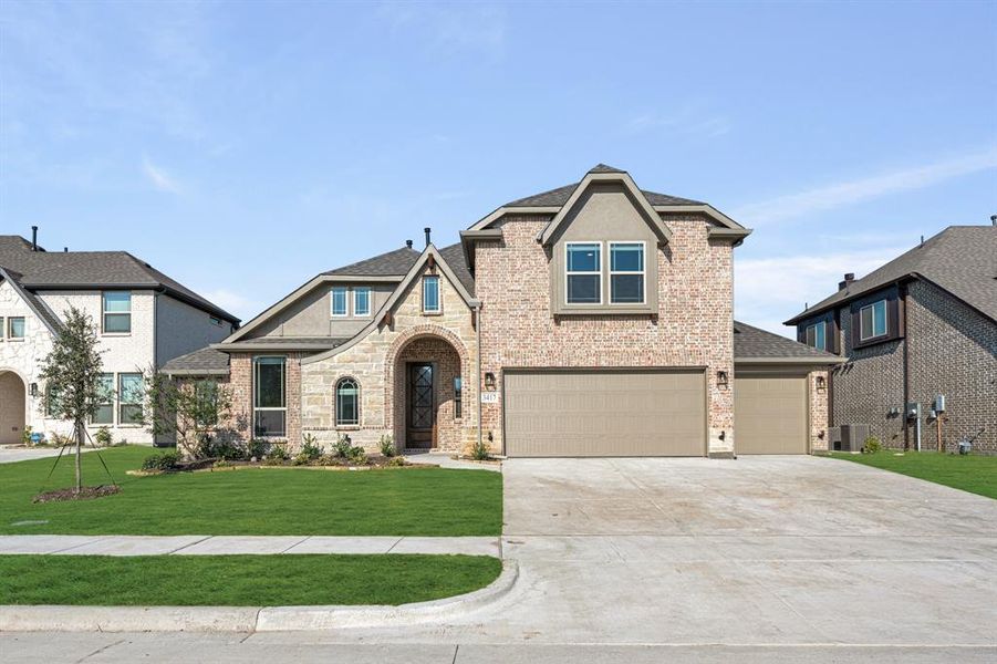 Front exterior of a new home in Liberty, Melissa, TX, highlighting curb appeal (Image 2).