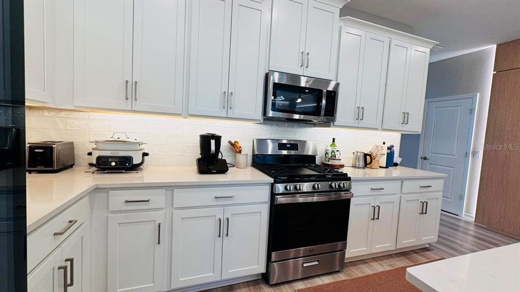 Furnished interior view inside a new home in Harvest at Ovation, Winter Garden (Image 15).