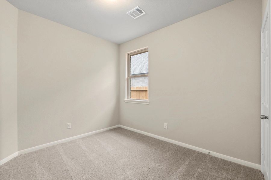 Spacious, unfurnished interior of a new home in Spring Creek Trails, Magnolia (Image 12).