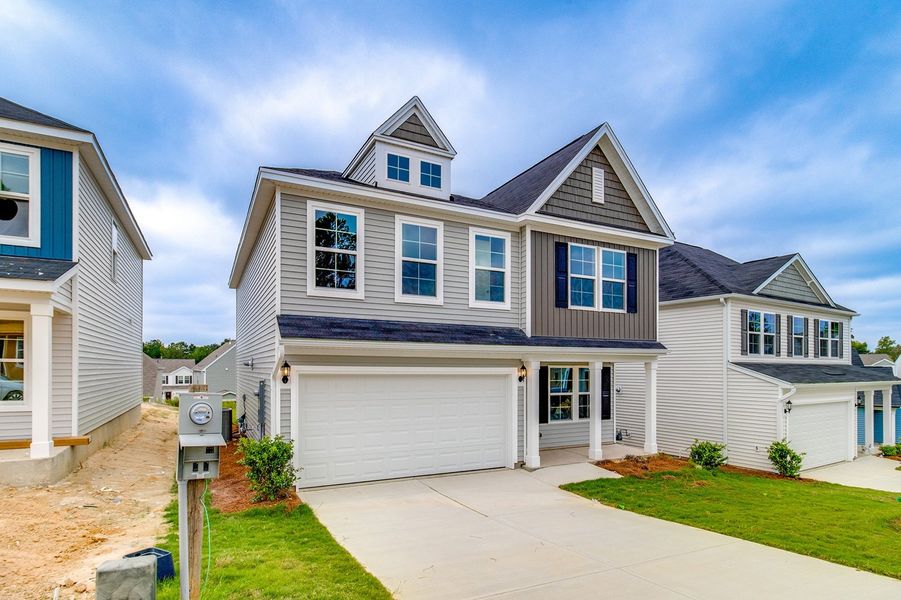 Front exterior of a new home in Bluefield, Lexington, SC, highlighting curb appeal (Image 20). Front exterior of a new home in Bluefield, Lexington, SC, highlighting curb appeal (Image 20).