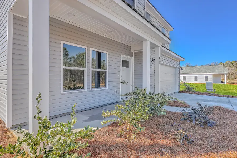 Exterior details and patio area of a home in , Holly Hill (Image 3).