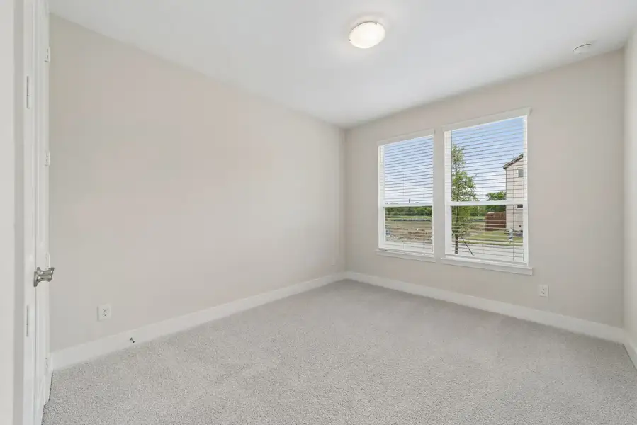 Representative unfurnished interior of a home built from the Delaney by Landon Homes in Lexington Frisco, Frisco (Image 26).