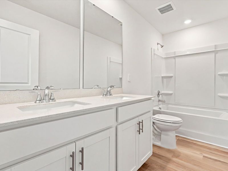 Furnished interior view inside a new home in Waterside - Boardwalk Series, Longs (Image 8).