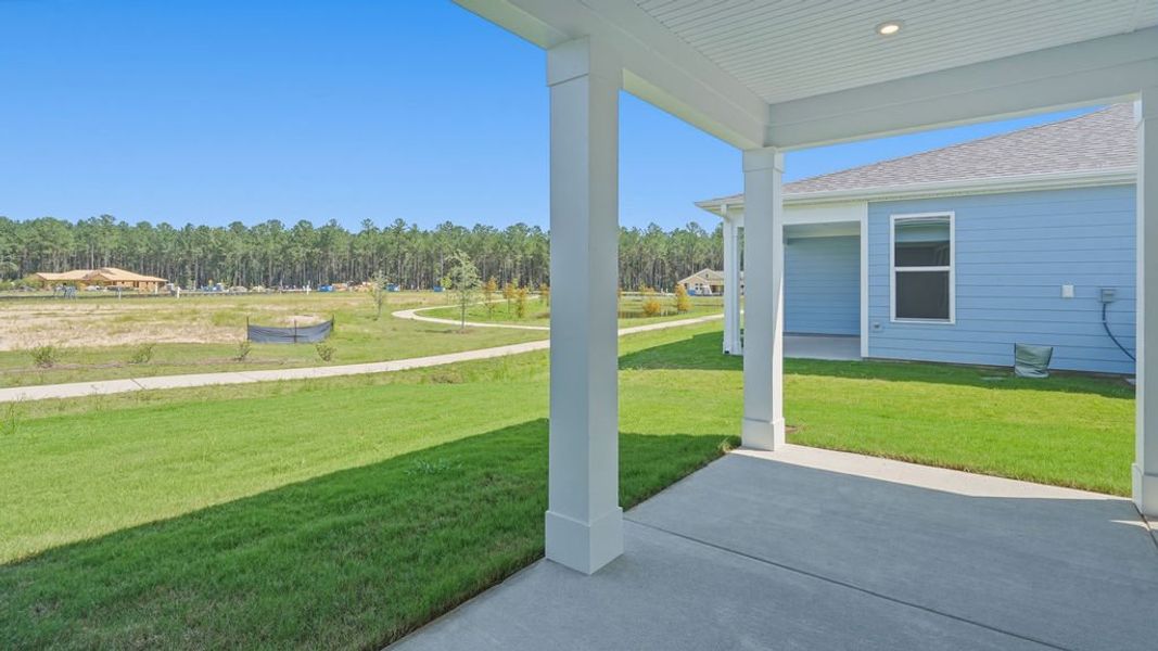Exterior details and patio area of a home in Sun City Hilton Head, Bluffton (Image 26).