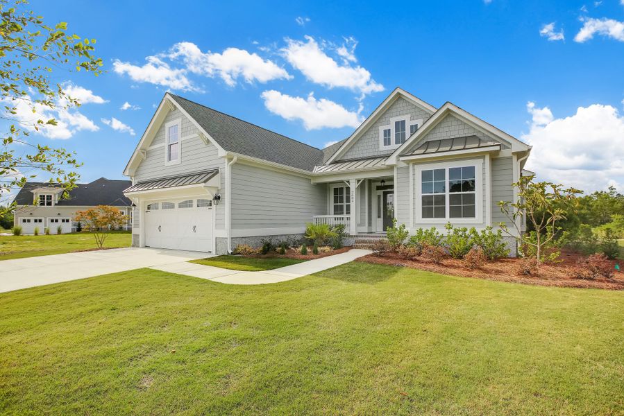 Representative exterior photo of a completed home built from the Ansley by Bill Clark Homes in The Sanctuary at Sunset Beach, Sunset Beach, NC (Image 24).