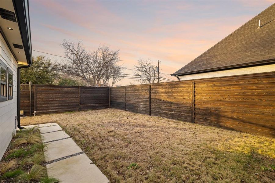 View of yard at dusk