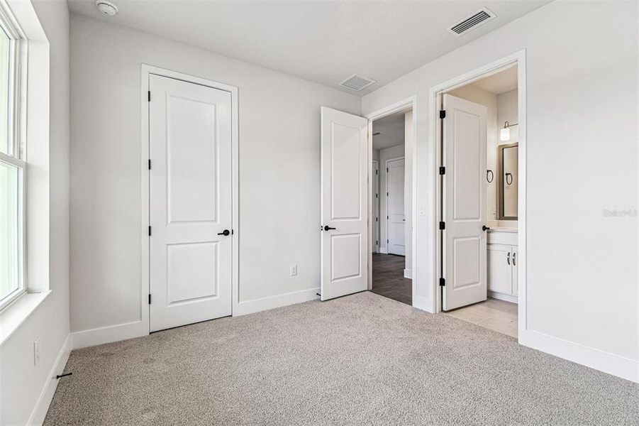 Spacious, unfurnished interior of a new home in The Peninsula at Rhodine Lake, Riverview (Image 15).