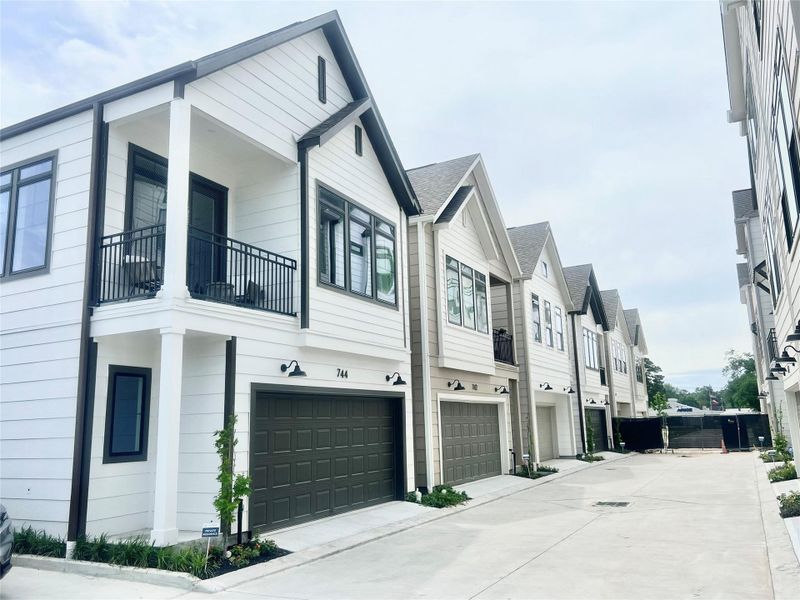 Front exterior of a new home in , Houston, TX, highlighting curb appeal (Image 20).