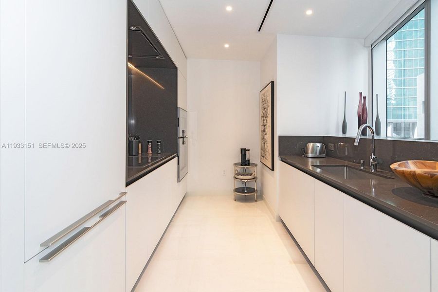 Furnished interior view inside a new home in Aston Martin Residences, Miami (Image 10).