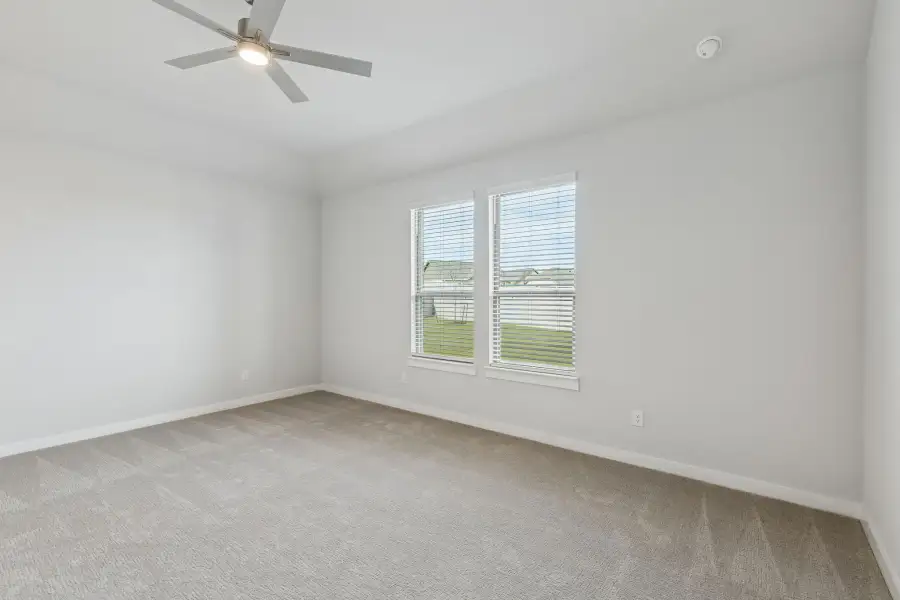 Primary Suite in the Stanley II home plan by Trophy Signature Homes – REPRESENTATIVE PHOTO
