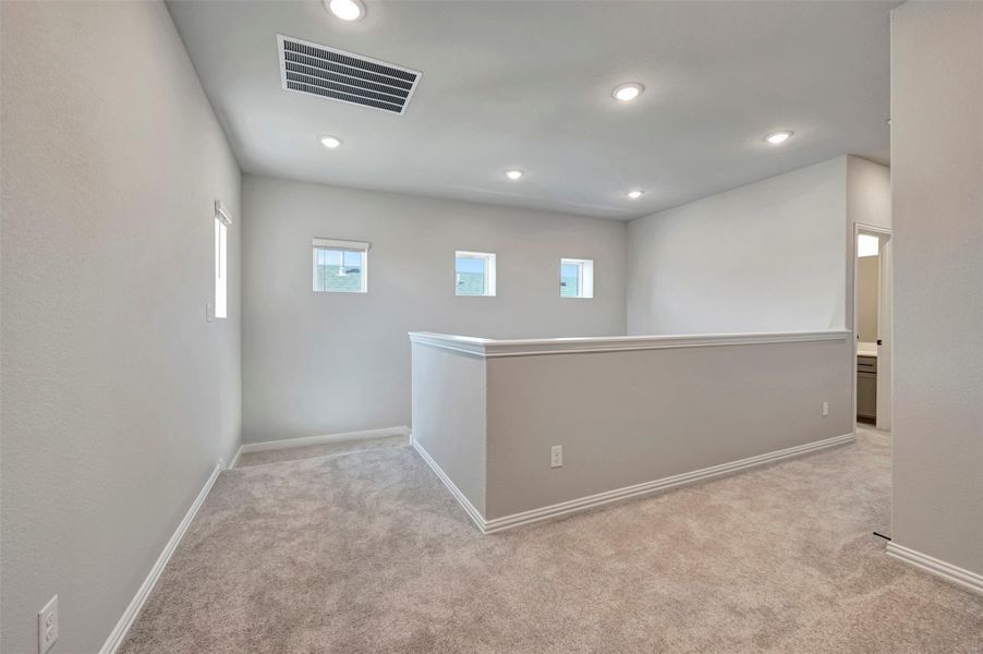 Spacious, unfurnished interior of a new home in Heritage, Dripping Springs (Image 20).