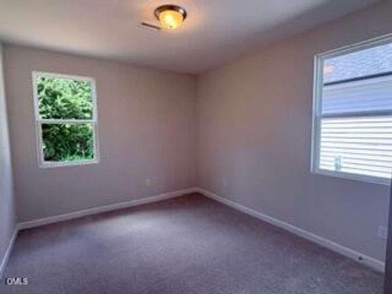 Spacious, unfurnished interior of a new home in Woodland Crossing, Zebulon (Image 15).