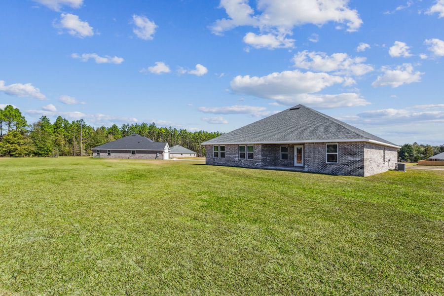 Representative exterior photo of a completed home built from the The Turquoise by Herbst Homes in Clear Water Landing, Milton, FL (Image 38).