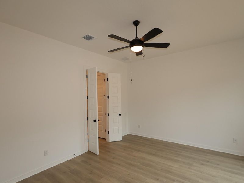 Spacious, unfurnished interior of a new home in Heritage, Dripping Springs (Image 15).