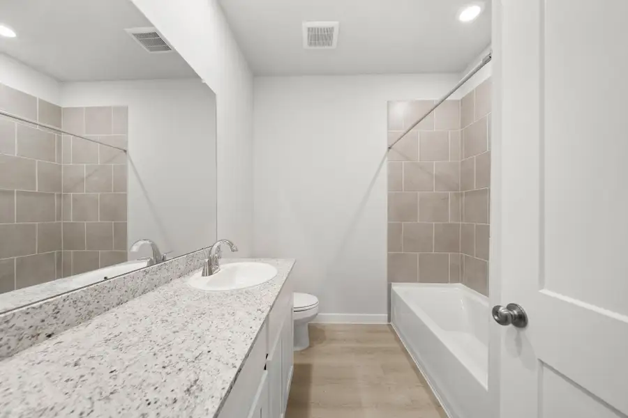 Furnished interior view inside a new home in Lexington Heights, Willis (Image 8).