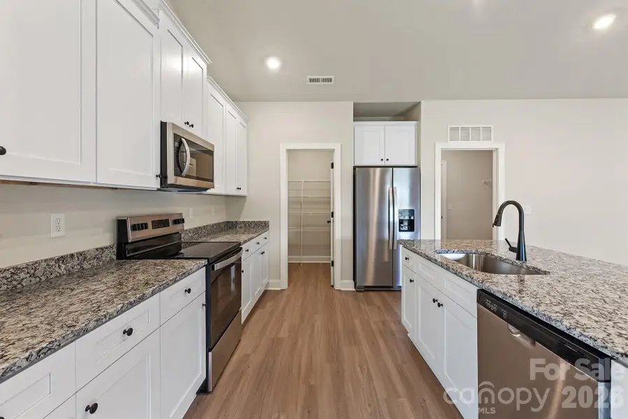 Furnished interior view inside a new home in Ascot Woods, Charlotte (Image 6). Furnished interior view inside a new home in Ascot Woods, Charlotte (Image 6).