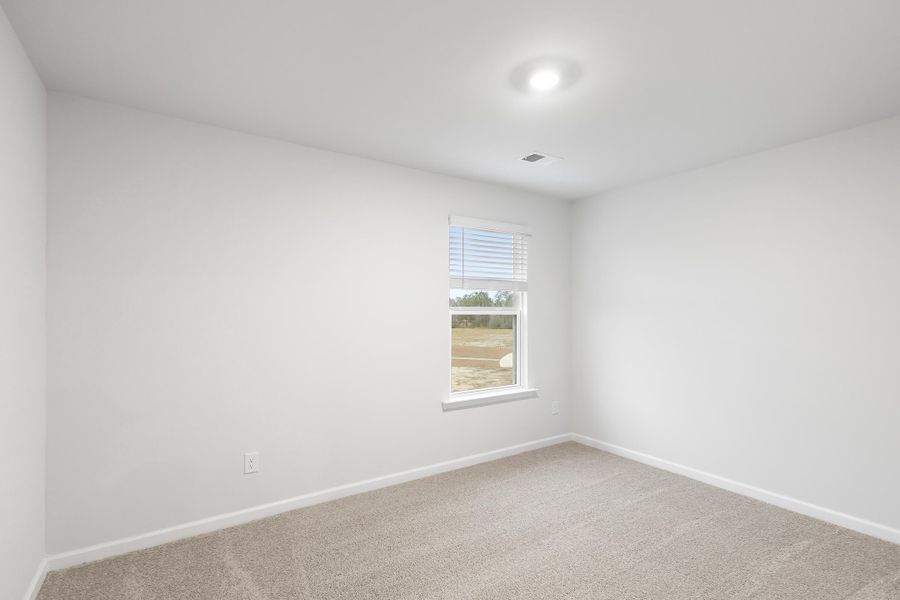 Spacious, unfurnished interior of a new home in The Cove at Mallard Crossing, Summerville (Image 22).