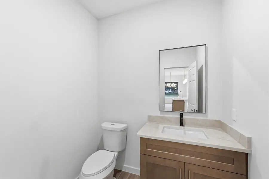 Furnished interior view inside a new home in , Conroe (Image 6).