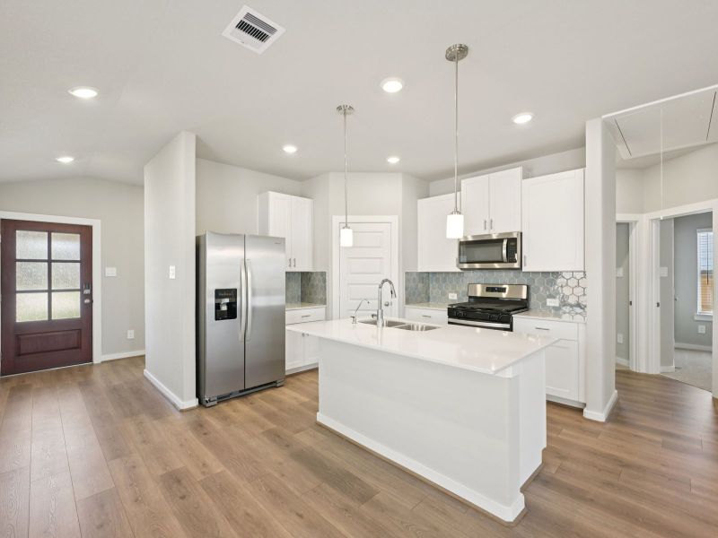 Furnished interior view inside a new home in Pine Lake Cove - Traditional Series, Montgomery (Image 4).